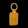 Ark Porte-clés Boobs en cuir - Moutarde > Femme Mode|Porte-clés
